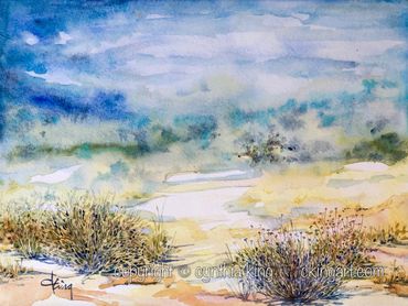 blue sky, clouds, desert plants, scrub,  gold, wash