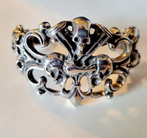 Bracelet - Stainless Steel 3 skulls on engine motor cuff