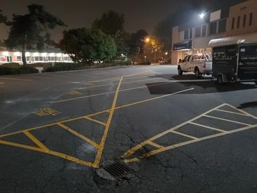 Parking lot redesign. Black and White Line Painting and Black & White Fine Line Painting.