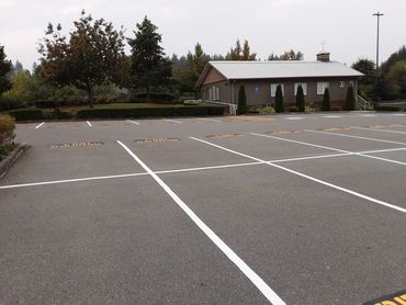 Repaint parking lot and signs. Black and White Line Painting and Black & White Fine Line Painting.