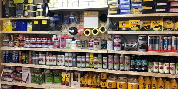 Image of Our Front Counter with Shelving of Products