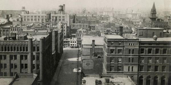 A black and white photo of Toronto circa 1913, harkening back to Royal LePage's history.