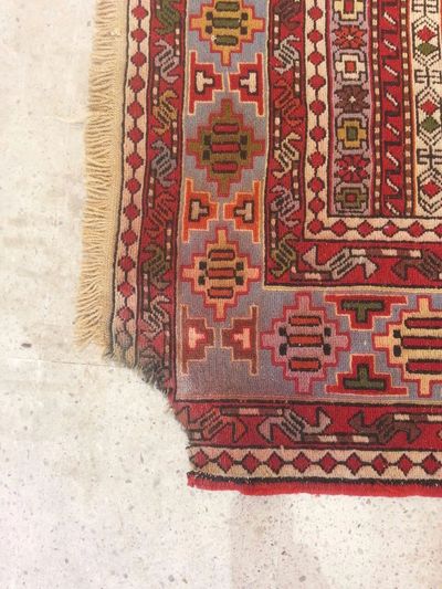 Persian carpet repair by Sheba Iranian Carpets stores.
