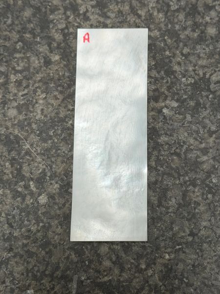 .032” x 1” x 3.5” White Mother of Pearl. A.