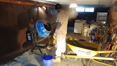mixing concrete for interior weeping tile