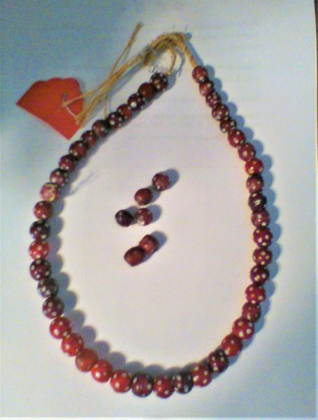 Red Skunk Beads