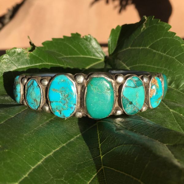 SOLD 1920s EARLY HANDMADE STAMPED INGOT SILVER 7 GREEN AND BLUE TURQUOISE ROW CUFF BIG WRIST
