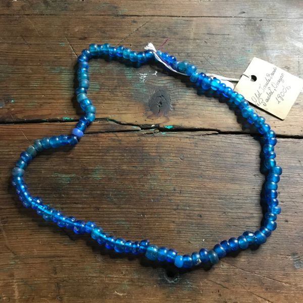 SOLD 1800s NATIVE AMERICAN GLASS TRADE BEADS MADREL HAND WOUND STRUNG ON AMERICAN DEERSKIN SHADES OR TURQUOISE TO COBALT BLUE