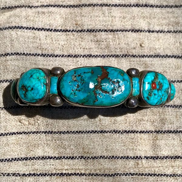 SOLD 1970s ZUNI PUEBLO HUMONGOUS GREASY NEON BLUE TURQUOISE NUGGETS WITH INLAID CORAL, TURQUOISE & HARDWOOD SANDCAST SILVER MENS CUFF BRACELET