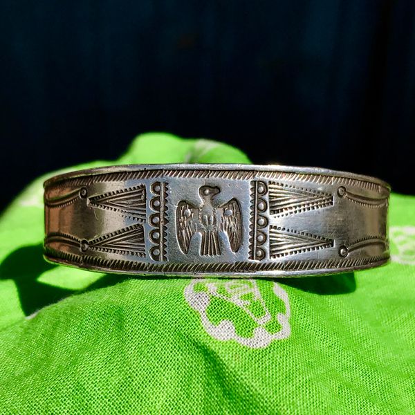 SOLD 1910s EARLY FRED HARVEY FILED, CHISELED & ROCKER ENGRAVED THUNDERBIRD STAMPED INGOT SILVER CUFF BRACELET