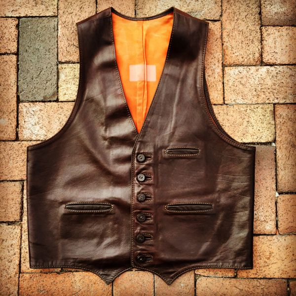 SOLD 1970s WESTERN COWBOY OILED LEATHER VEST