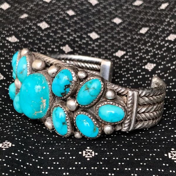 SOLD 1920s HAND PULLED HAND DRAWN INGOT WIRE HEAVY BIG VIVID TALL OVAL DOMED BLUE CORN PATTERN TURQUOISE ROW CUFF HAND CUT BEZELS BRACELET