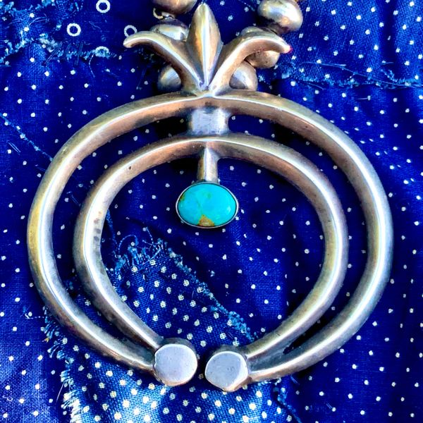 1930s STYLE SANDCAST SILVER AND BLUE TURQUOISE NAJA PENDANT OF AN UNKNOWN AGE