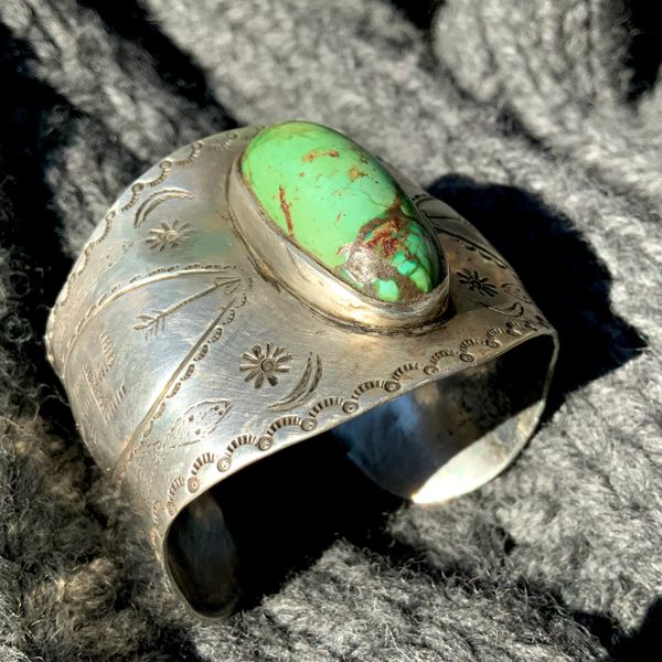 SOLD 1910S HOPI WIDE LARGE WRIST INGOT SILVER EARLY REPOUSSE' PRAYER SNAKES, STAR PEOPLE STARS, MOONS, ARROWS, CLOUDS, WHIRLING LOGS OVAL DOMED PALE GREEN TURQUOISE STONE INGOT SILVER CUFF BRACELET