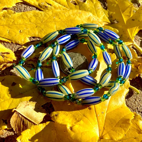 1700s VENETIAN GLASS GREASY YELLOW & WHITE HAND-PAINTED STRIPED COBALT BLUE TRADE BEADS AFRICA TRADE BEADS MELON STRIPED BEADS & BLUE & GREEN SEED BEADS FROM EARLY 1900s 28" LONG