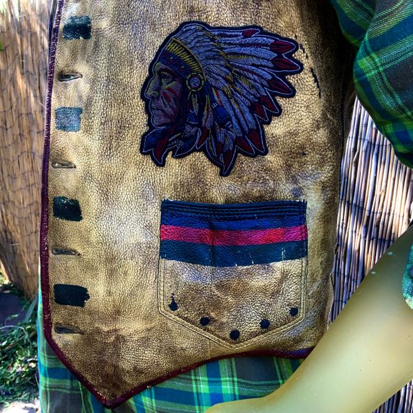 SOLD VINTAGE LEATHER HAND PAINTED VEST WITH EMBROIDERED INDIAN CHIEF HEAD PATCH