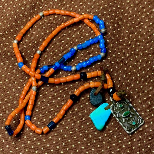 1940s FRED HARVEY SILVER TURQUOISE ZIA DOG TAG, PALE BLUE TURQUOISE TAB, JET TAB, ANTIQUE & VINTAGE BLUE GLASS TRADE BEADS, CORAL BEADS & SILVER BENCH BEADS
