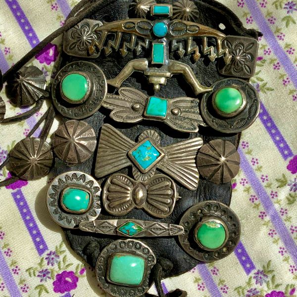 1890s - 1930s INGOT SILVER AND TURQUOISE PIN AND CONCHO COLLECTION ON TOBACCO POUCH BANDOLIER BAG