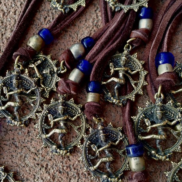 BRASS SHIVA THE DESTROYER NECKLACE on AMERICAN DEER SKIN