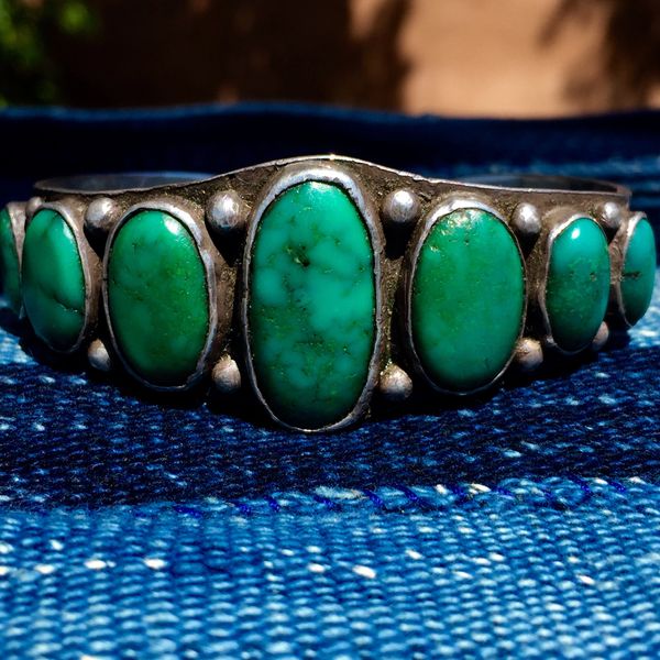 SOLD 1920s INGOT SILVER STAMPED AMERICAN WIDE 7 CERILLOS TURQUOISE OVAL STONE CUFF