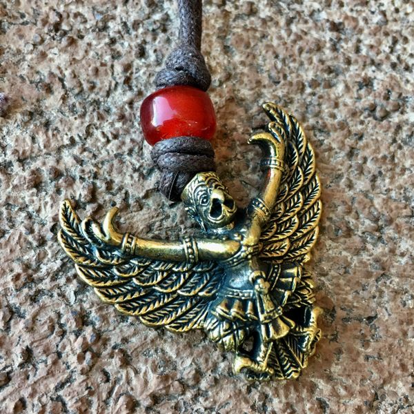 BRASS GARUDA PENDANT on COTTON