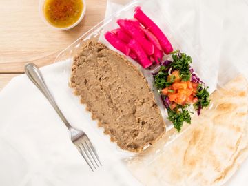 gluten-free vegan pureed lentils entree, cabbage salad with house dressing turnip pickles pita bread