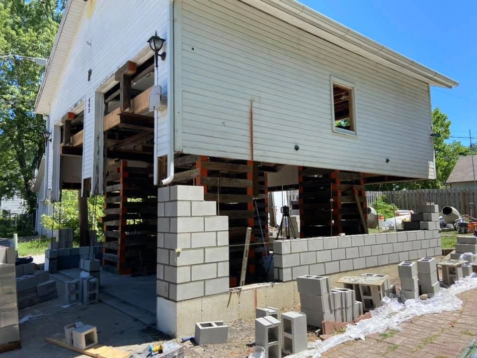 A house construction with bricks and front lamp 