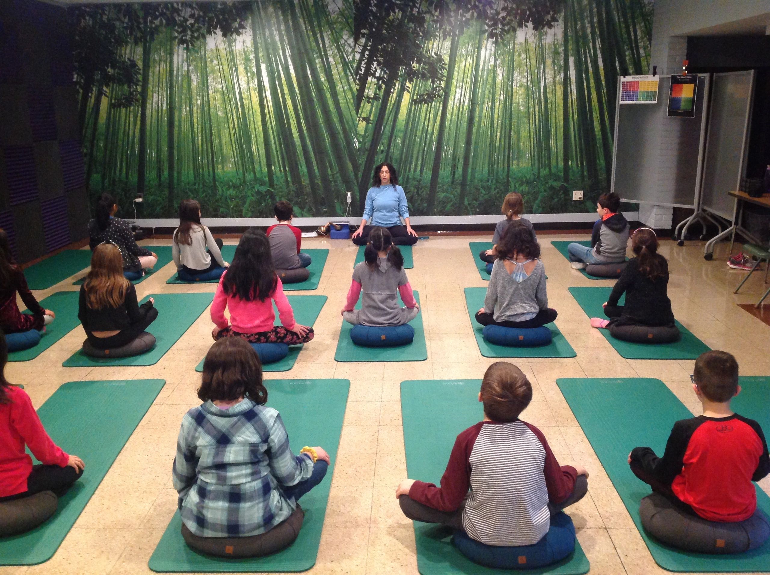 Leading calm guided mindfulness and breathing yoga for Chappaqua elementary school students