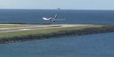 Flight landing at STT airport
Stray Shower Charters
Bareboat Catamaran Sailing Vacation