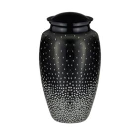 Tall black urn with white speckled pattern