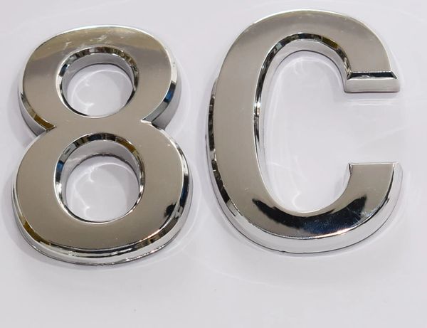 DOB SIGNS: 1 SIGN– SILVER (PLASTIC NUMBERS FOR MAIL BOXES IN NYC)