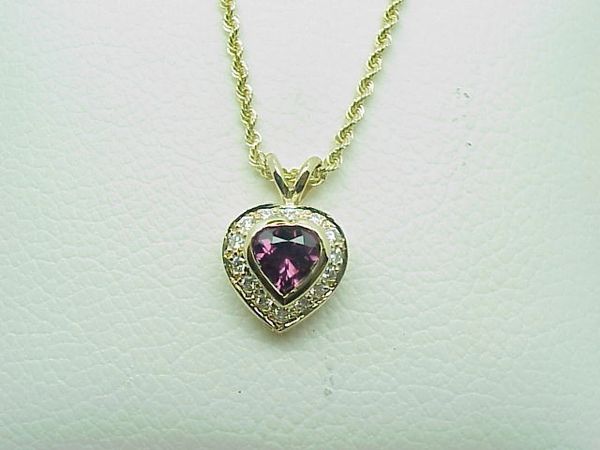 14 Karat Yellow Gold Bezel-Set Garnet and Diamond Heart-Shaped Pendant ...