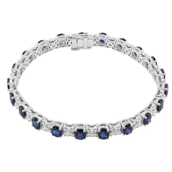 18 Karat White Gold Oval Sapphire and Round Diamond X-Pattern Line ...