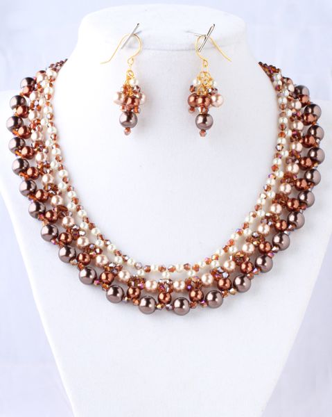 Hand woven brown ascending glass pearls with small crystals