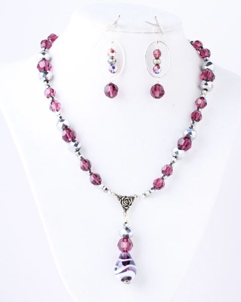 Swarovski amethyst crystals with matching lamp-work glass beads