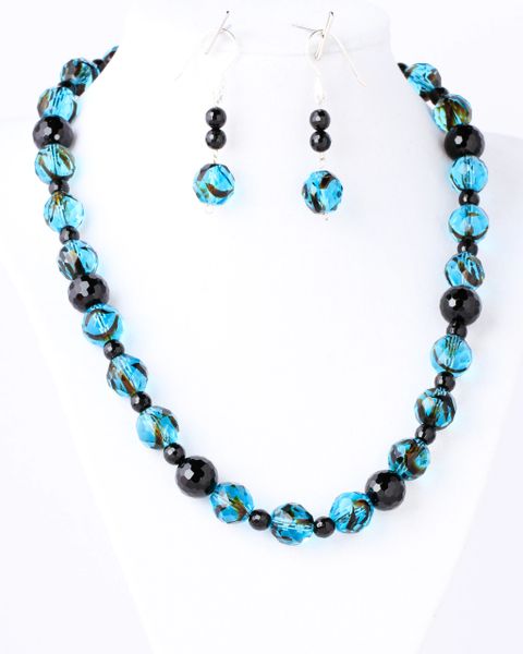 Czech glass turquoise with black swirl beads accented with natural black onyx