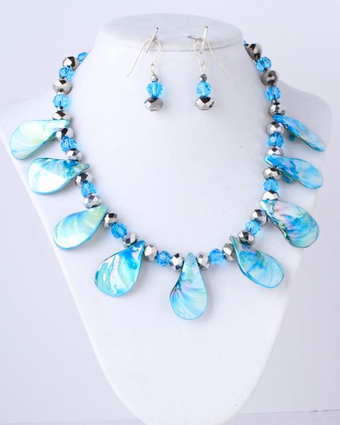 Blue dyed shell with silver and turquoise matching crystals