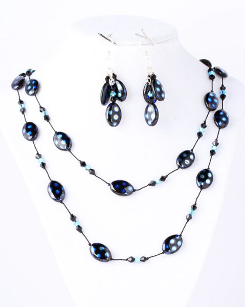 Polka-dot black/turquoise glass beads pearl-knotted with Swarovski black and turquoise bicones