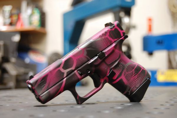 Glock 19 Gen 4 Cerakoted using Crushed Silver and Prison Pink