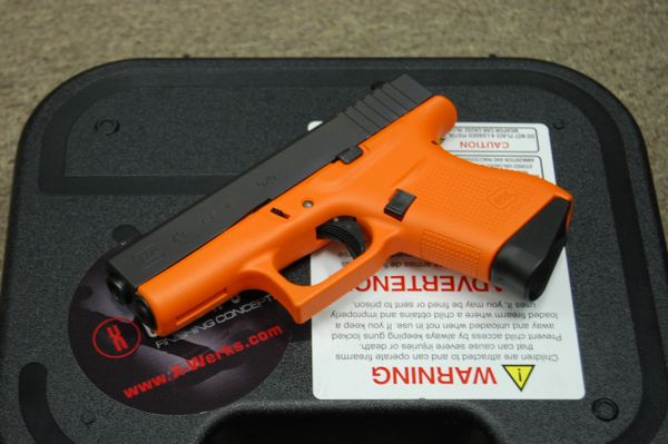 X-Werks Cerakote Hunter Orange Glock 43 43X 48 badass Trijicon | X-Werks