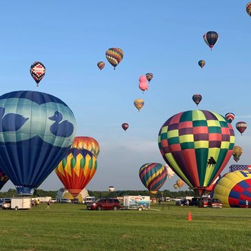 The Just Ducky Hot air balloon at a hot air balloon festival. 