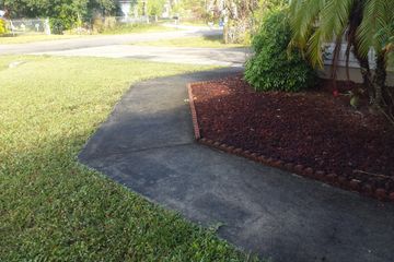Sidewalk cleaning by Wizard pressure washing