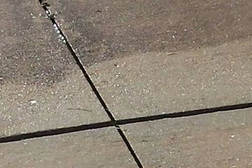 Driveway cleaning by Wizard pressure washing.
