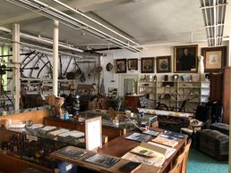 Early farm equipment and household items. 