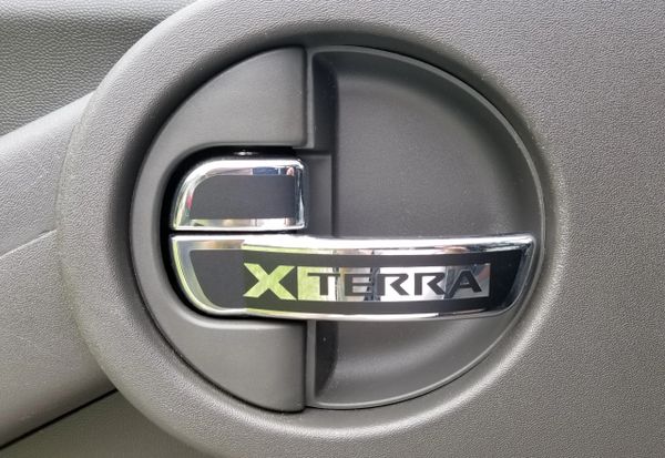 Gen 2 Nissan Xterra/ Frontier interior lock button and door handle block out vinyl kits