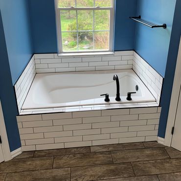 bathroom renovation. New tile , tub and floors