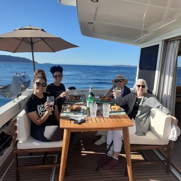 A family having a meal on the yacht