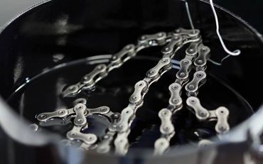 Chain being dipped with AbsoluteBlack Wax