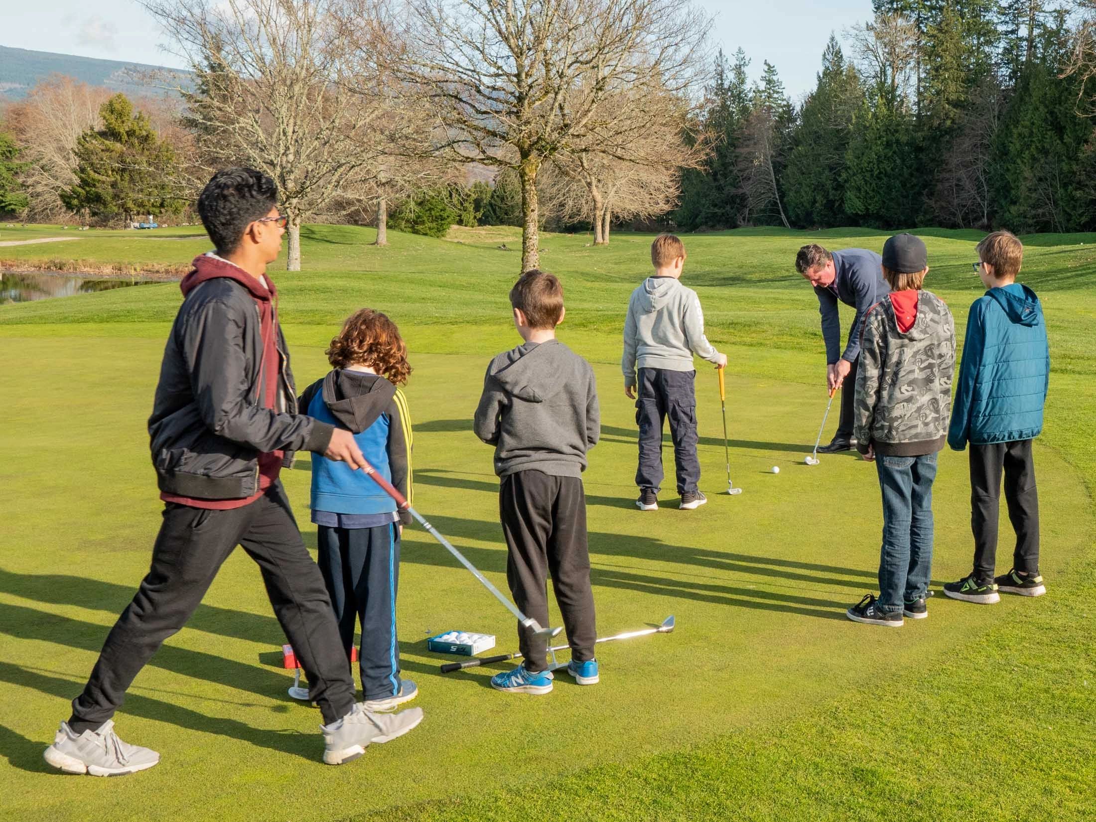 Putting lessons  by Chris Lowe for Juniors at Blue Ocean Golf Club in Sechelt 