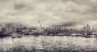 View along the Thames , looking away from Waterloo bridge.